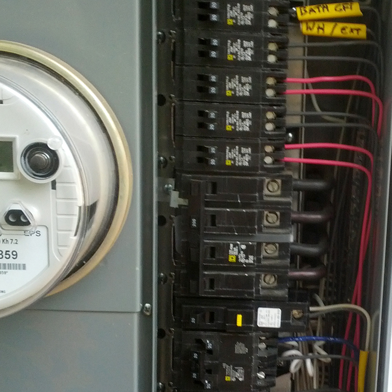 close up of electrical panel and circuit breakers